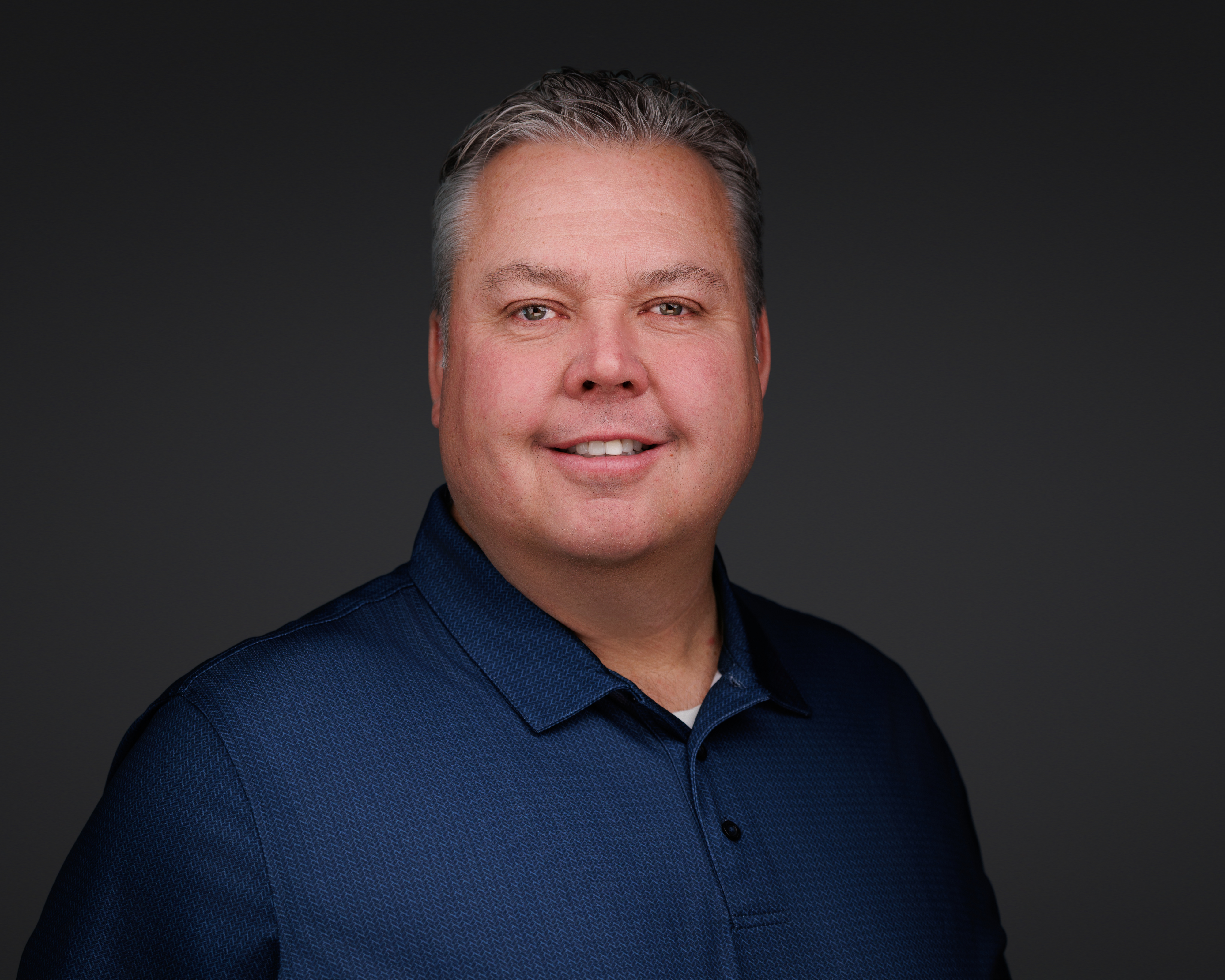 a man in a blue shirt