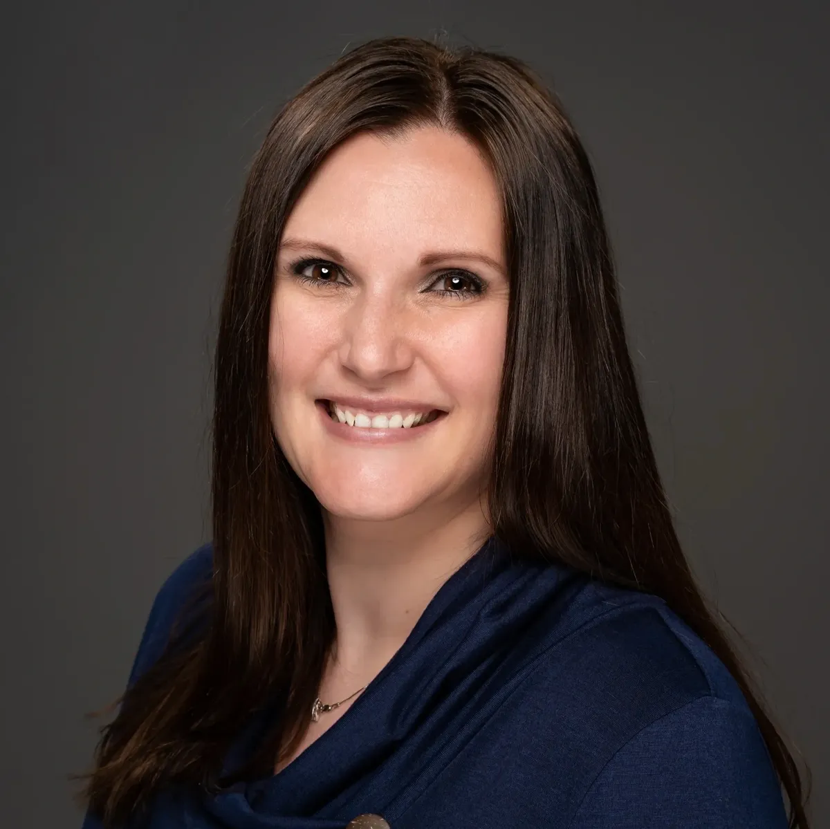 a woman smiling for a picture
