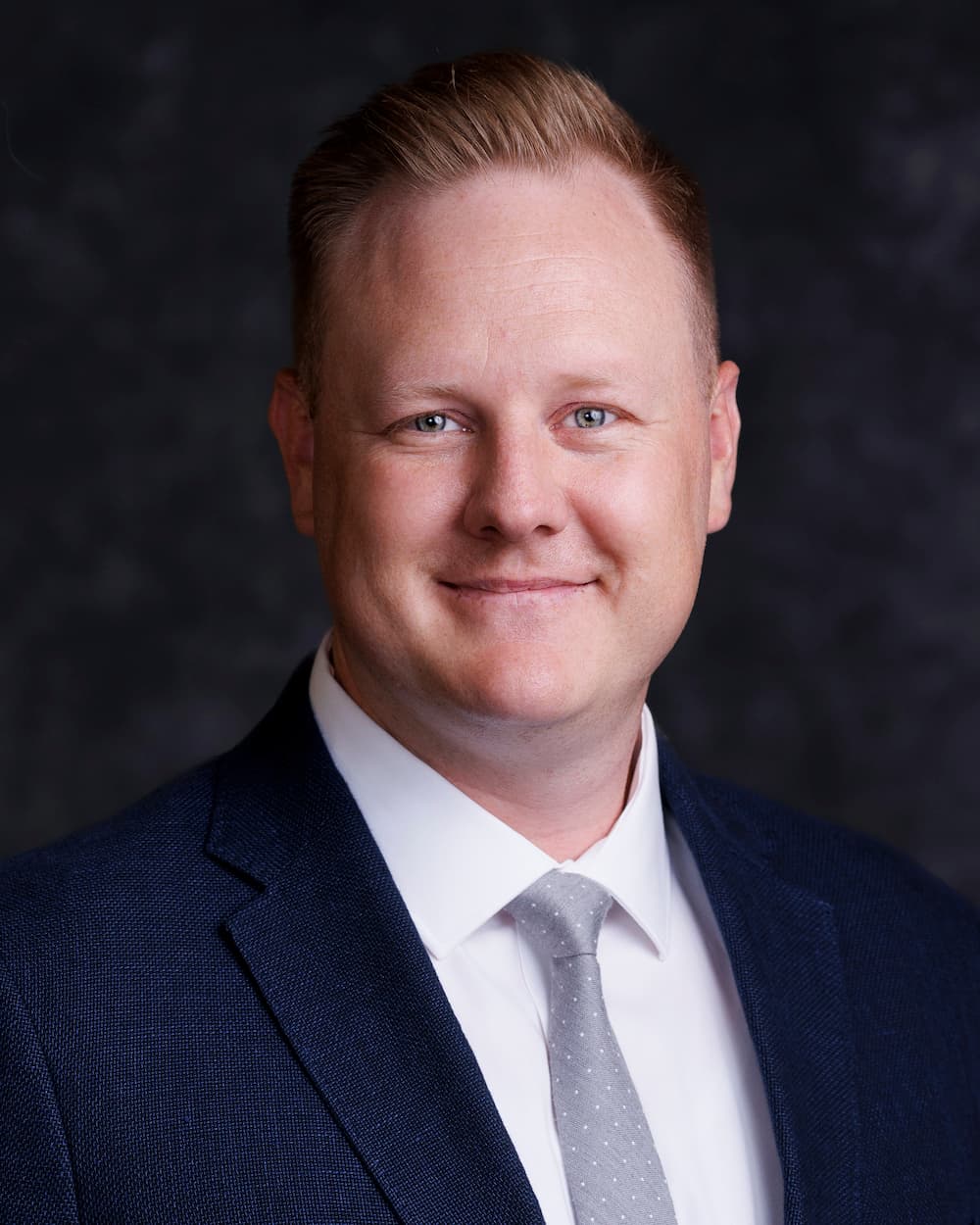 a man in a suit and tie