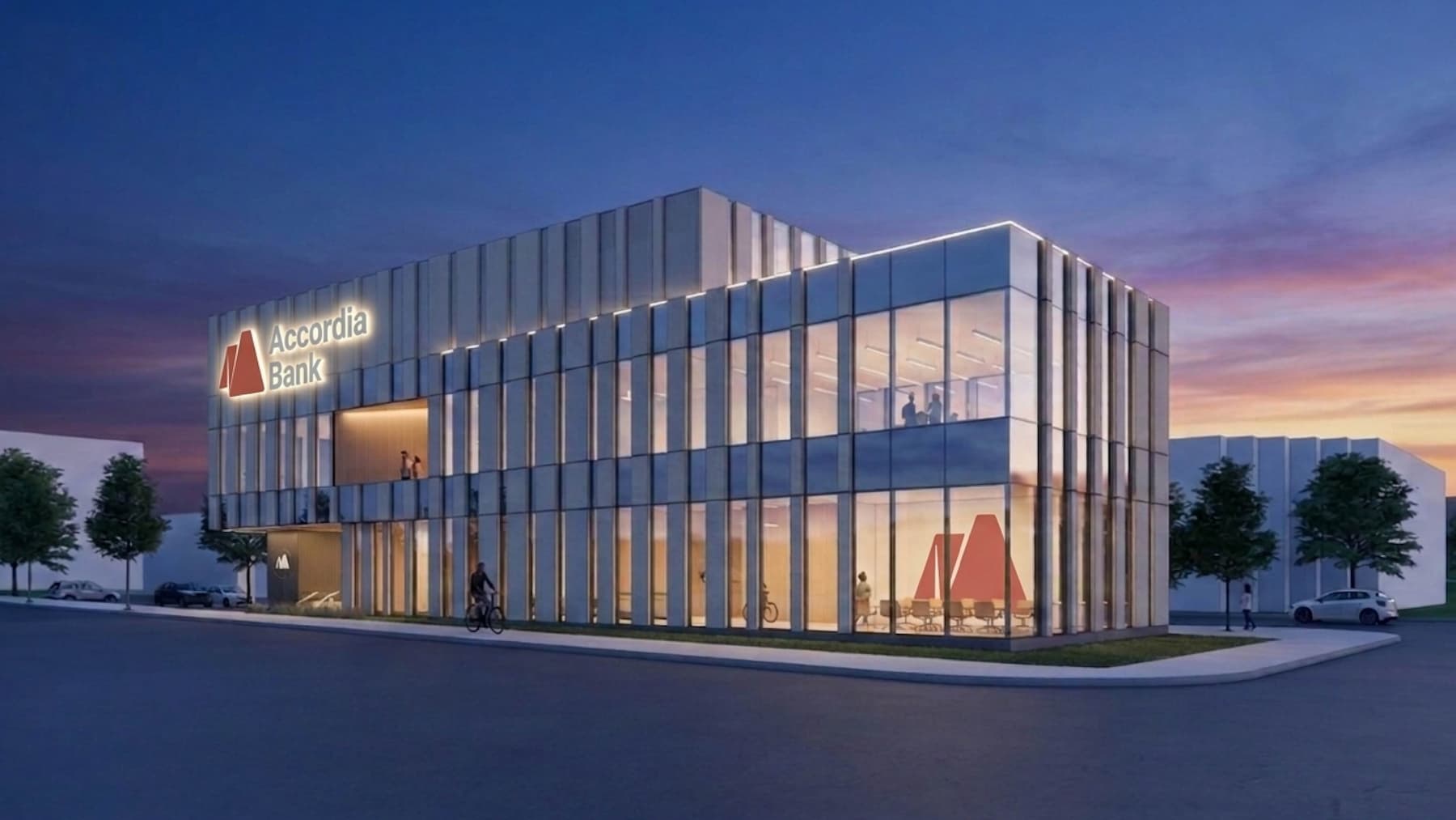 a building with glass walls and a sign