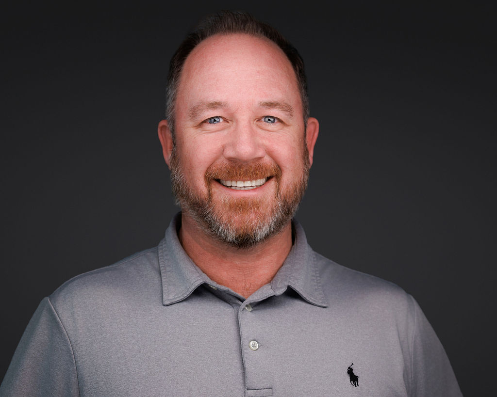 a man in a grey shirt