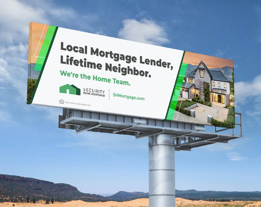 a billboard with a house and trees in the background