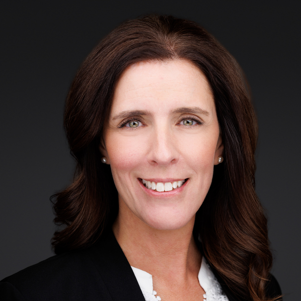 a woman smiling for a picture