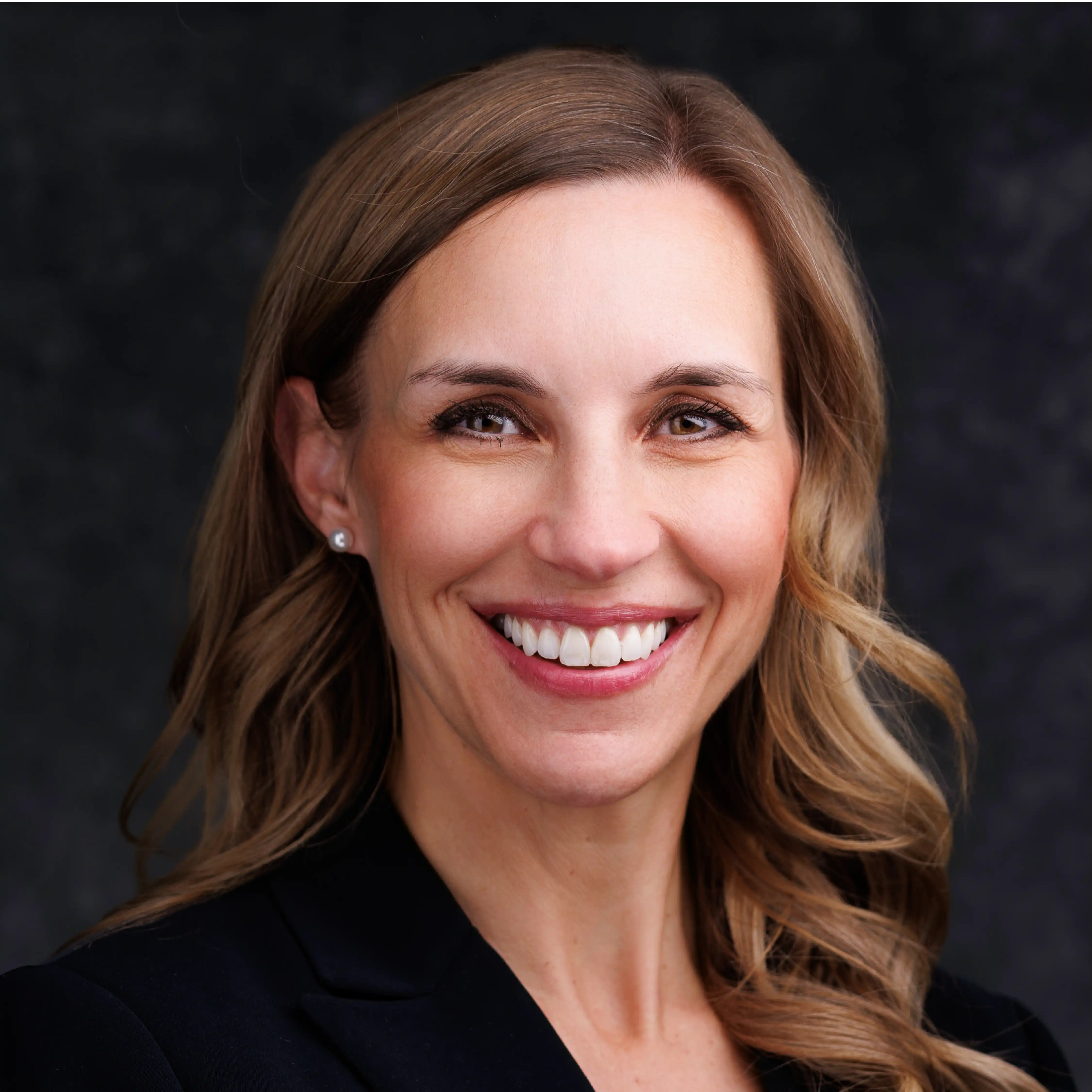 a woman smiling at camera