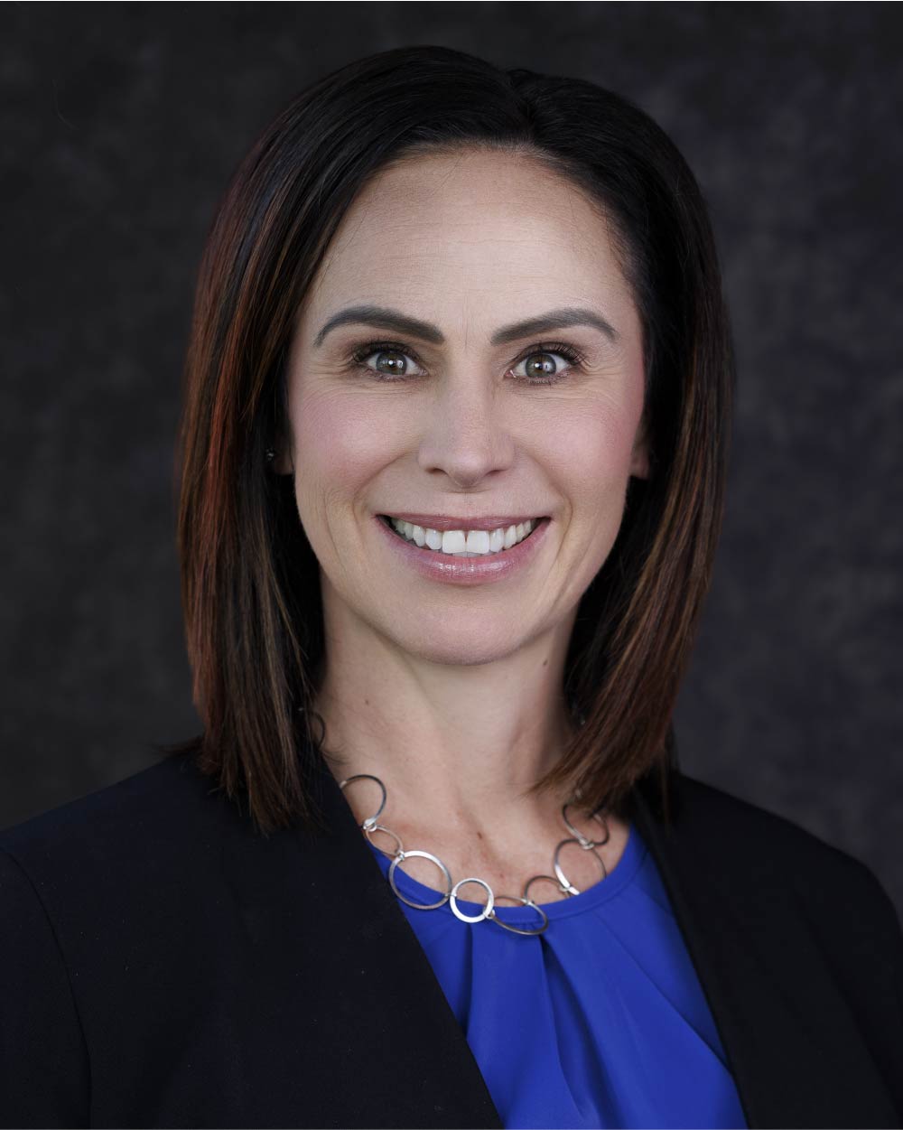 a woman smiling for a picture