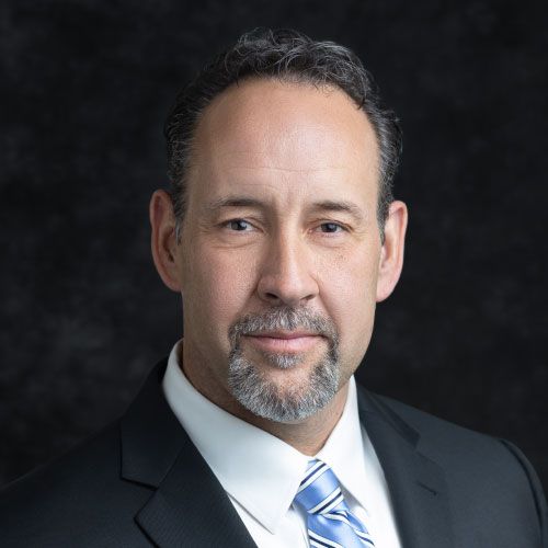 a man in a suit and tie