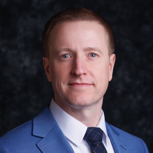 a man in a suit and tie
